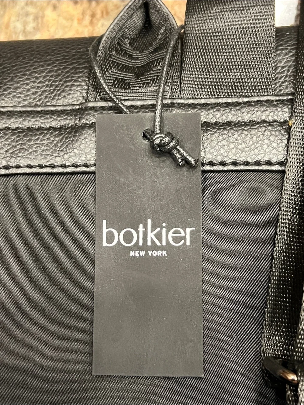 NWT’S Botkier New York Trigger Mini Backpack in sleek black & Faux Leather Trim